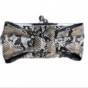 Jessica Simpson Leather clutch snake pattern brown